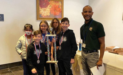 members of menlo's chess club at a competition